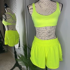 Neon yellow Lululemon sport bra and shorts set